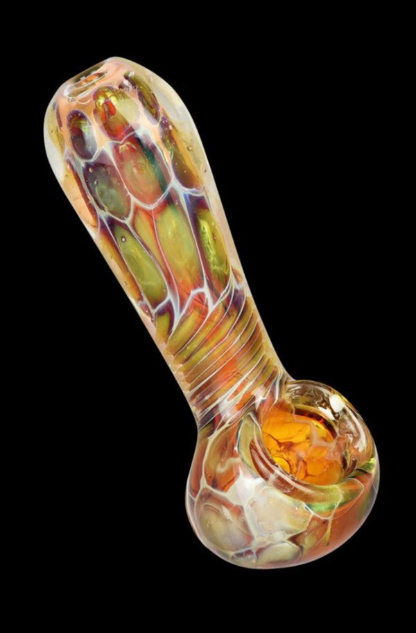 A close-up, angled view of the Golden Sea Turtle Shell Design Spoon Pipe, showcasing its sculpted, patterned glass body.