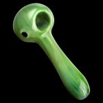 A three-quarter view of the Hard Candy Spoon Pipe - Green Apple, showcasing its smooth, curved shape and glossy finish.
