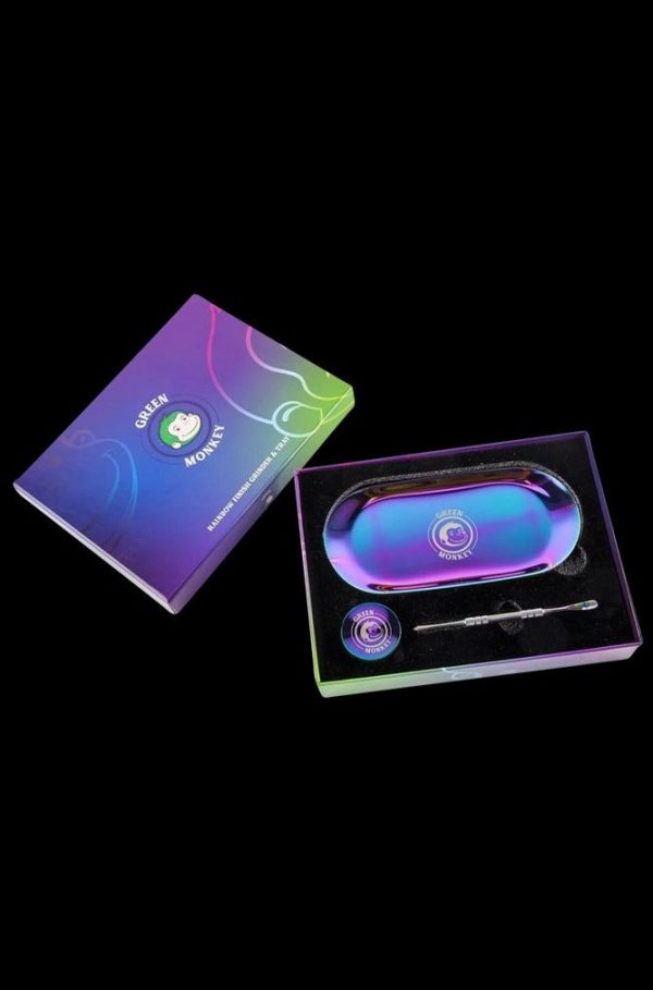 Front view of the Green Monkey Rainbow Finish Rolling Tray & Grinder Kit, showcasing its vibrant, colorful finish on a black surface.