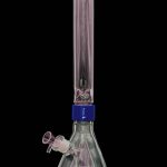 A tall, clear glass bong with pink and green swirls, illuminated from within, against a black background.