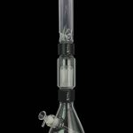 Clear glass bong with ice catcher and diffused downstem, isolated on black.