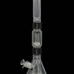 Glass water pipe (bong) with dual percolators, against a black background.