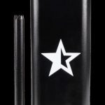 Black metal cannabis one-hitter pipe and storage tube with a white star emblem.