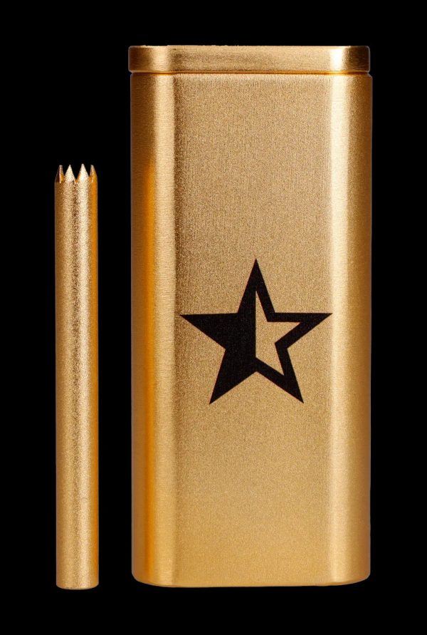 Gold-toned smoking kit with a one-hitter and storage tube featuring a black star emblem.