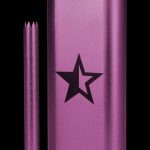 Pink metal dugout one-hitter with a five-pointed star logo.
