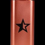 Copper-colored lighter with a five-pointed star emblem.