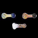Three colorful glass smoking pipes against a black background.