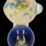 Hand-blown glass pipe with a celestial, planet-like design.
