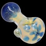 Blue and cream glass cannabis pipe with speckled pattern.