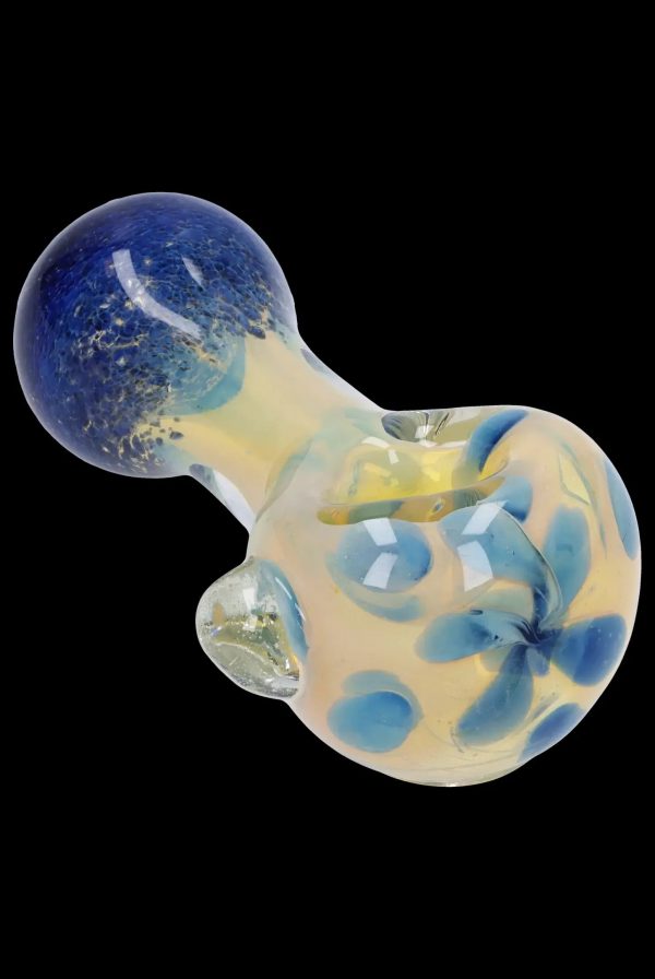 Blue and cream glass cannabis pipe with speckled pattern.