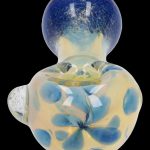 Hand-blown glass cannabis oil rig with blue and yellow floral pattern.