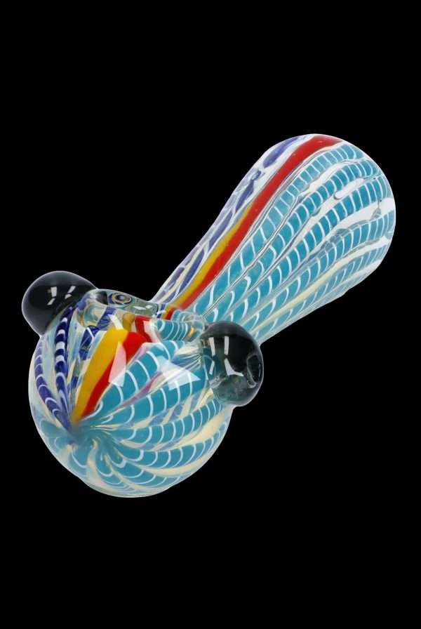 Hand-blown glass pipe with vibrant blue, red, and yellow swirls.