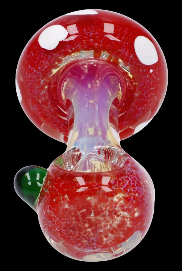 Red glass mushroom-shaped pipe for smoking cannabis.