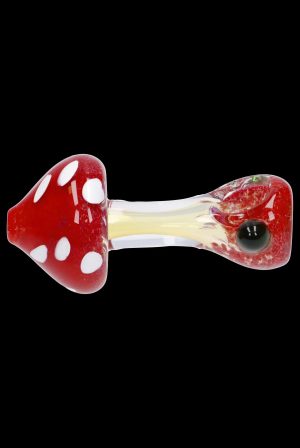 Red and white spotted glass mushroom pipe with a textured bowl.