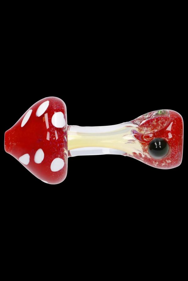 Red and white spotted glass mushroom pipe with a textured bowl.