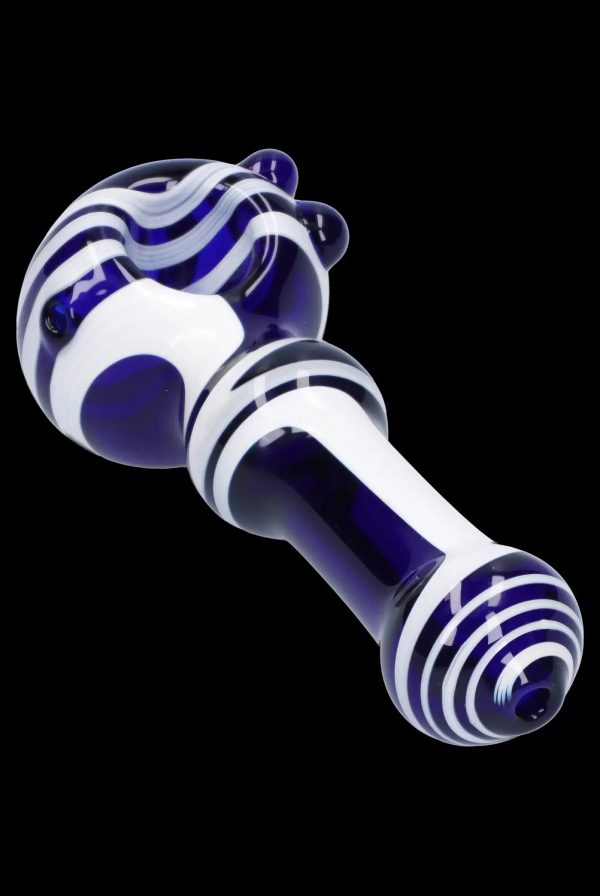 Blue and white striped glass pipe for cannabis use.