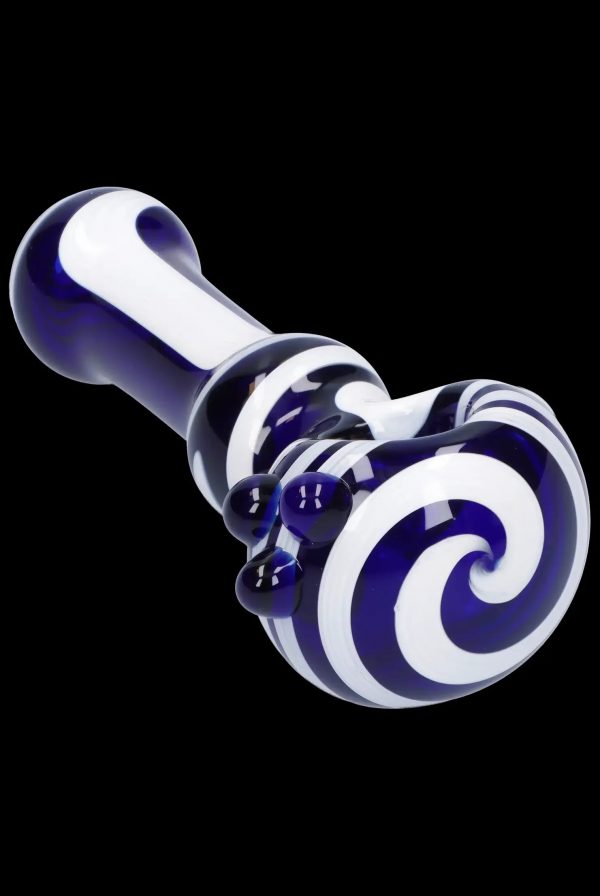 A close-up, angled view of the Swirl Color Tube Pipe - 4.5 in, showcasing its swirling color pattern in a sleek glass design.