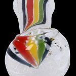 Clear glass oil burner pipe with red, yellow, and green stripes.