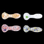 Four colorful glass smoking pipes against a black background.