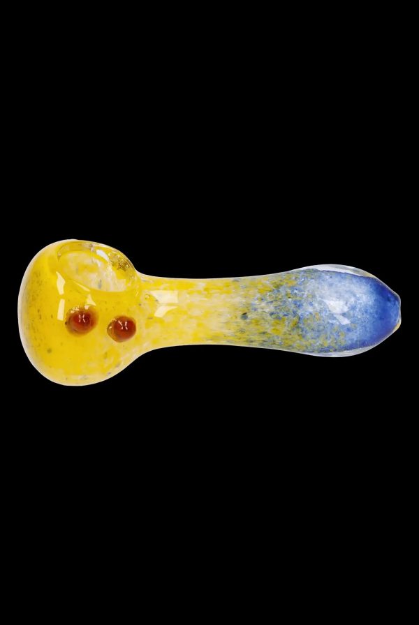 Glass pipe with yellow and blue gradient, studio shot.