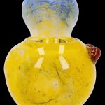 Yellow and blue glass bubbler with visible bowl and mouthpiece.