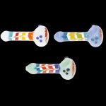 Three colorful silicone smoking pipes against a black background.