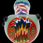 Hand-blown glass cannabis water pipe with vibrant red, white, and blue swirl design.