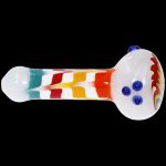 Colorful glass smoking pipe on a black background.