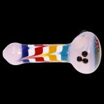 Colorful glass pipe with speckled bowl against a black background.