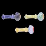 Colorful glass pipes arranged on a black background.