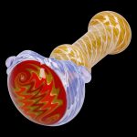 Hand-blown glass pipe with red and gold swirling patterns.