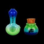 Blue and green glass cannabis pipes with “RY2” branding, against a black background.
