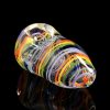 A studio shot of the LA Pipes Rainbow Strings Spoon, displaying vibrant colorful glass swirls and a mirrored reflection.