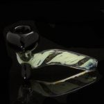 A close-up, angled view of the LA Pipes Mini Sherlock with Slyme Cane and Dichro, showcasing its colorful glasswork.
