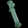 Green glass cannabis pipe isolated on a black background.
