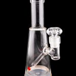 Clear glass water pipe (bubbler) with wooden base, isolated on a black background.