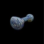 Blue glass pipe with swirling patterns on a black background.