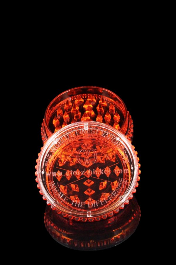 A close-up, angled view showcases the Storz & Bickel Plenty Vaporizer with a sleek, modern design against a dark background.