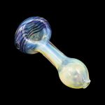 Glass cannabis pipe with blue and yellow swirls against a black background.