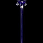 Blue glass cannabis oil burner pipe isolated on a black background.