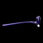 Purple glass cannabis oil burner pipe isolated on a black background.