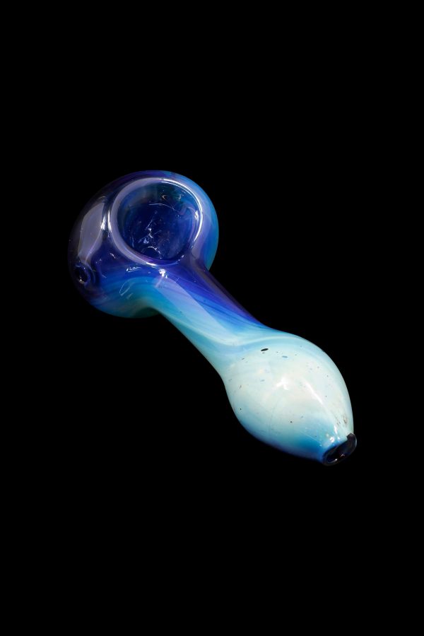 Glass pipe with blue and white swirling coloration against a black background.