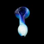 Glass pipe with blue and white swirling patterns against a black background.