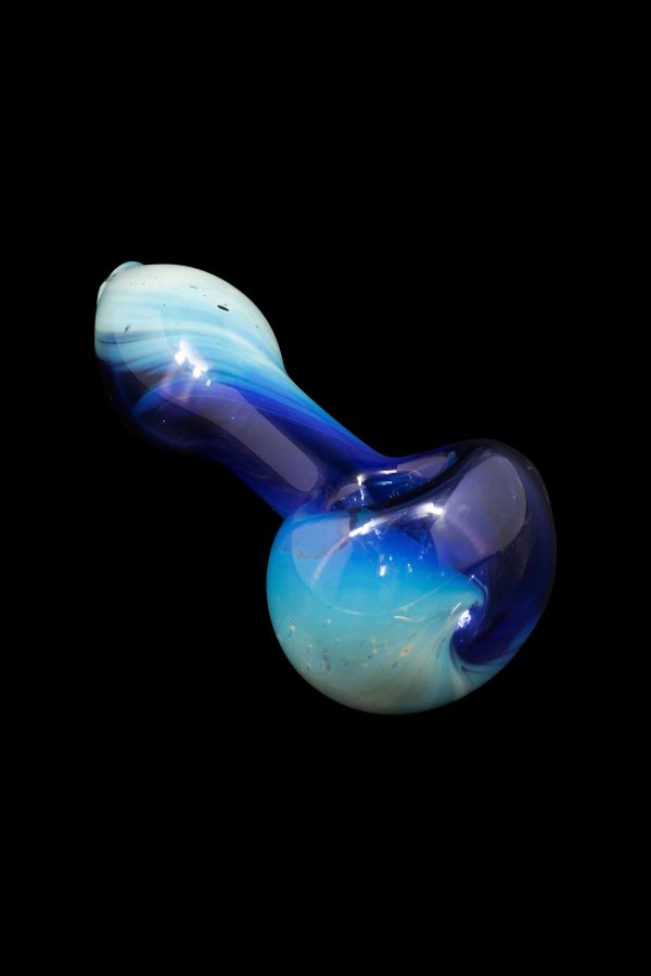Blue and teal glass pipe against a black background.