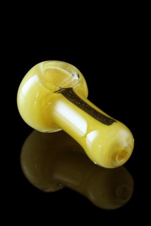 A side view of the Glassheads "Dichro Strip" Spoon, featuring a colorful, reflective band on clear glass.