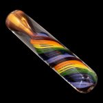 Hand-blown glass pipe with vibrant, layered rainbow colors.