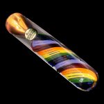 Hand-blown glass pipe with vibrant rainbow layering.