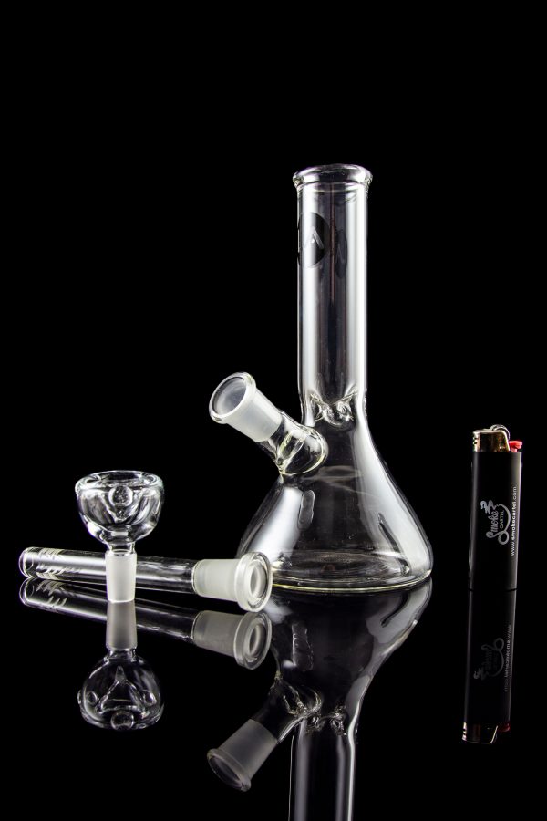 A studio shot of the LA Pipes Basic Beaker Water Pipe - Simply Guy, showcasing its clear glass construction in a downward-angled view.