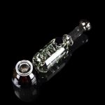 Glass cannabis pipe with intricate green and clear glasswork against a black background.