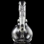 A studio shot features the LA Pipes Mini Bubble Base Concentrate Rig in clear glass, reflected on a dark surface.